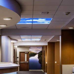 CDH inpatient behavioral health, nurse station, calming alcoves, and large-format calming art
